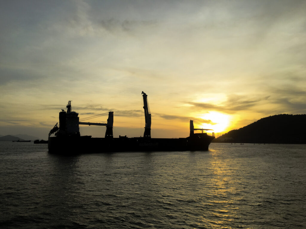 50553435 a big cargo ship in the sunrise near vung tau city vietnam
